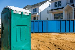 porta potty outside of a house constraction